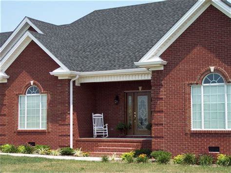 grey metal roof on red brick house|shingles for red brick house.